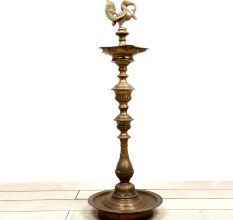 Long Brass Oil Lamp with Peacock Design.