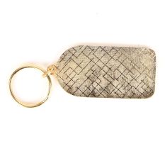 Brass Whitehouse Brass Key Ring With Blue Background