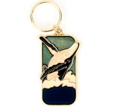 Dolphin On Brass Key Chain With Green Color In The Background