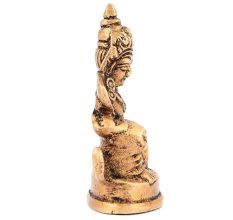 Brass Kuber Sitting Statue