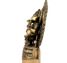 Brass Sitting Ganesha with Decorative Background