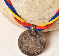 Bronze Circle Pendant With Fading Design