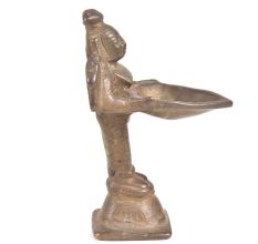 Brass Oil Lamp Diya Held By The Tribal Lady