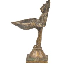 Brass Lady Holding A Diya In Her Hand On A Raised Platform