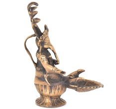 Brass Ganesha Sitting With Sheshnag And Diya