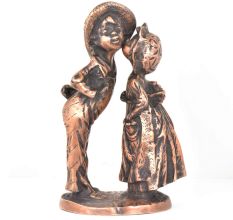 Figurines of a Girl  kissing a Boy