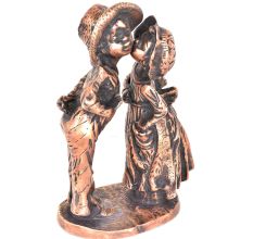 Figurines of a Girl  kissing a Boy