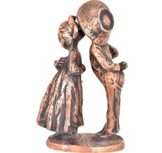Figurines of a Girl  kissing a Boy