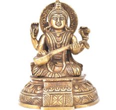 Brass Goddess Sarswati Sitting On A Raised Platform