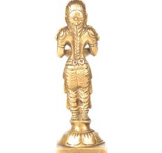 Brass Lady Standing On A Raised Platform Holding A Diya