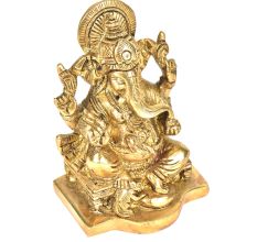 Brass Ganesha Sitting On A Chowki