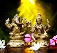 Brass Ganesha Sitting On A Raised Platform