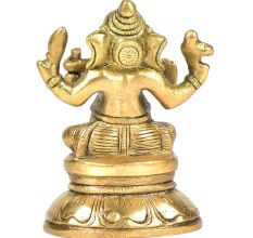 Brass Ganesha Sitting On A Raised Platform