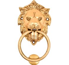 Brass Lion Head Door Knocker With A large Brass Ring Gripped In Its Mouth