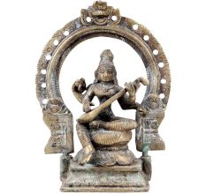 Goddess Saraswati Playing Veena with Floral Prabhavali