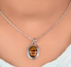 92.5 Sterling Silver Pendant Studded With Big Oval Tiger Eye Stone Decorative Border