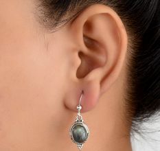92.5 Sterling Silver Earrings Studded With Round Citrine In Holy Cross Design