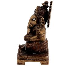 Brass Ganesha Statue Sitting On A Chowki