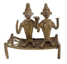 Two Tribal Men Figurines Sitting On Charpai