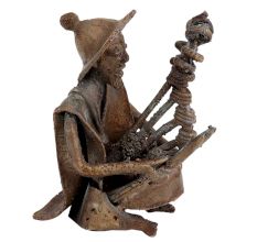 Brass Tribal Musician With Rare Musical Instrument