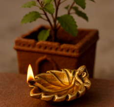 Brass Ganpati And Leaf Oil Lamp Diya