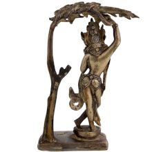 Brass Goddess Statue Under A Tree
