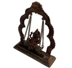 Brass Ganesha Sitting On Swing With Decorative Prabhavali