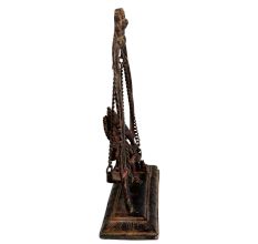 Brass Ganesha Sitting On Swing With Decorative Prabhavali