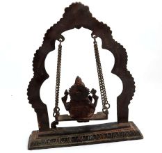 Brass Ganesha Sitting On Swing With Decorative Prabhavali