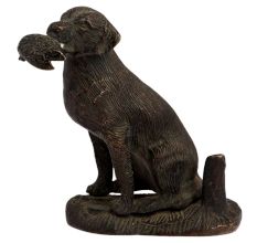 Brass Sitting Dog Statue Holding Flesh Of A Animal