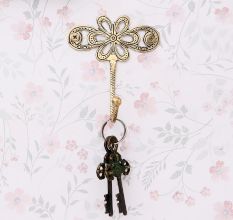 Single Brass Flower Wall Mounted Hook In Antique Finish