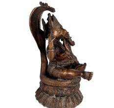 Brass Ganesha Statue With Sheshnag and Laxmi On His Lap