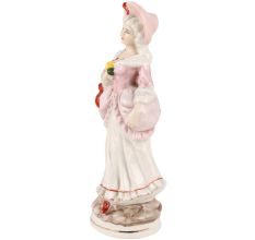 Porcelain Figurine Of A Lady Standing In Pink Dress