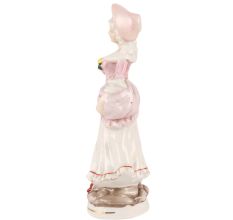 Porcelain Figurine Of A Lady Standing In Pink Dress