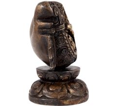 Brass Ganesha Sitting in a Conch In Black Finish