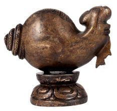 Brass Ganesha Sitting in a Conch In Black Finish
