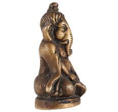Brass Statue of Lord Ganesha Playing Harmonium
