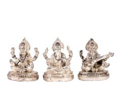 Copper Idols Of Goddess Saraswati Lakshmi and Lord Ganesh In Silver Finish