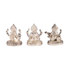 Copper Idols Of Goddess Saraswati Lakshmi and Lord Ganesh In Silver Finish