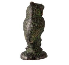 Brass Statue OfÂ Owl Sitting on a Log