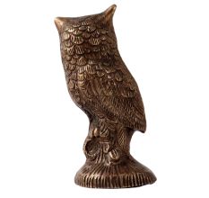 Brass Owl  Statue Perched On Top Of A Wooden Branch