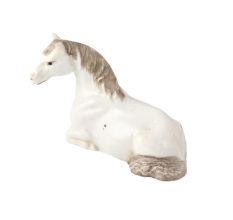 Porcelain Statue Of  A Young Resting Horse