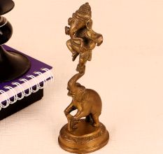 Brass Statue of Lord Ganesha Standing on Elephant Trunk
