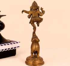 Brass Statue of Lord Ganesha Standing on Elephant Trunk