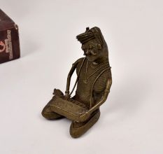 Handcrafted Tribal Art Brass Statue of Man Playing Instrument