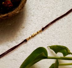 Classic Handmade Rakhi: Brass Beads Style