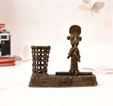 Vintage Brass Tribal Man Playing Instrument Statue in Bastar Art