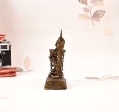 Vintage Brass Tribal Man Playing Instrument Statue in Bastar Art