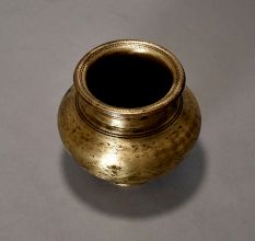 A Holy Water Pot With Dotted Design Made Of Pure Brass