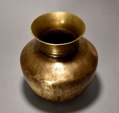 A Pure Holy Water Pot In Plain Design